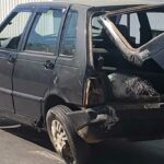 Motorista embriagado e inabilitado bate carro contra mesas e acerta muro de barbearia em João Pinheiro
